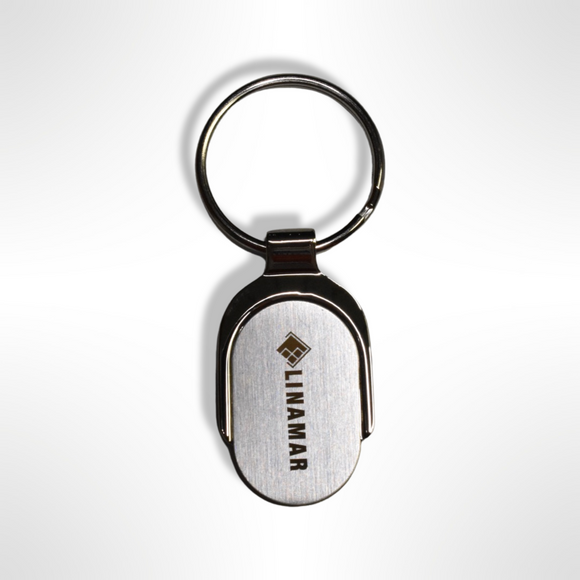 Linamar keychain with company logo, a silver metal keychain featuring the Linamar logo in black. The perfect accessory for any Linamar employee. Great for keeping keys organized and easy to find. 